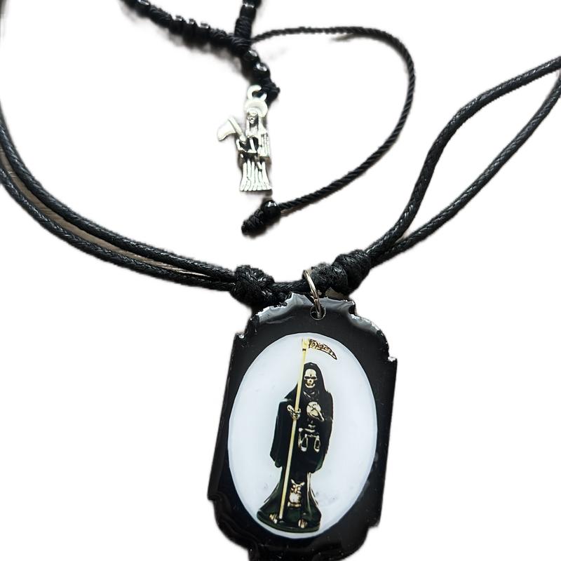 Black Santa Muerte necklace and bracelet unisex matching set. Adjustable sizes on both.