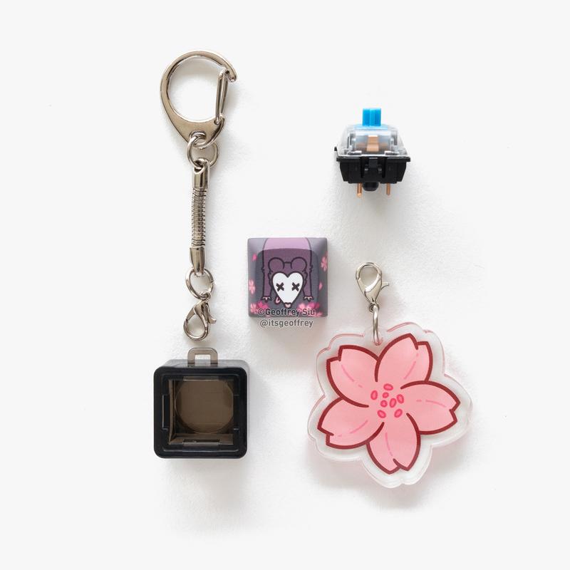 Garbage Clicky Keychains with Blue Gateron Switch and Bonus Tail Charm