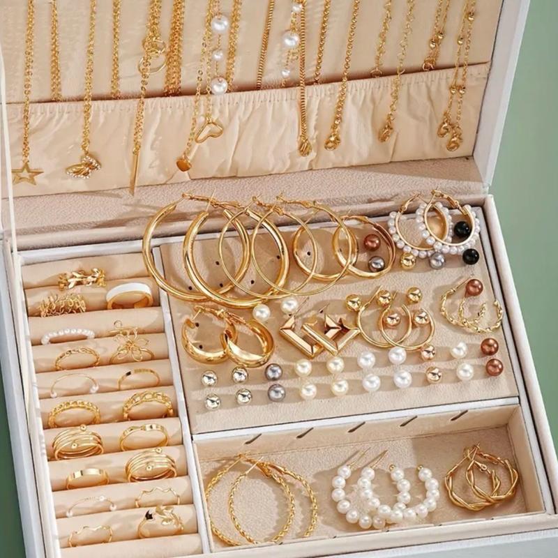 56 piece jewelry set. Earrings, rings, necklace